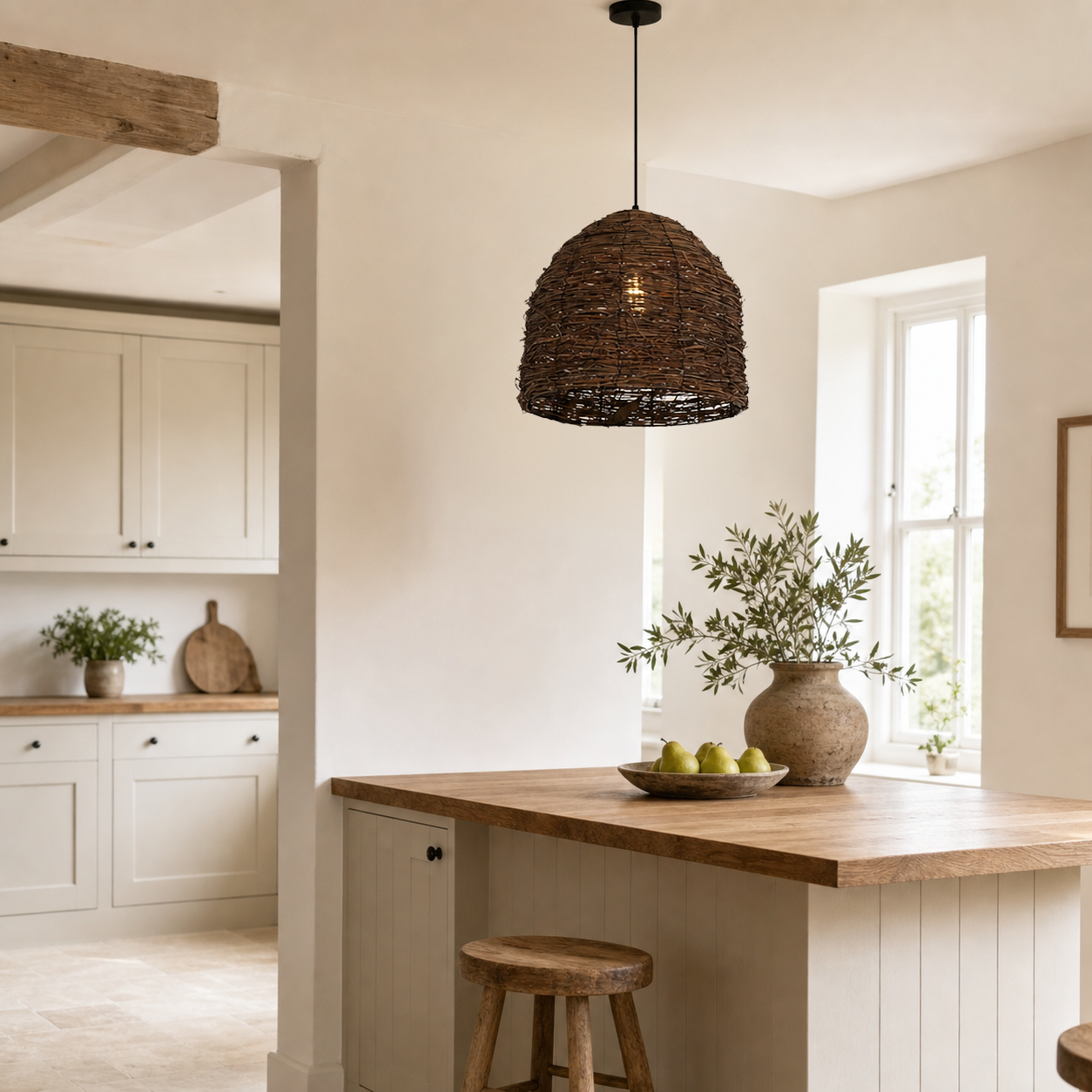 rattan dome pendant light beside a bright window