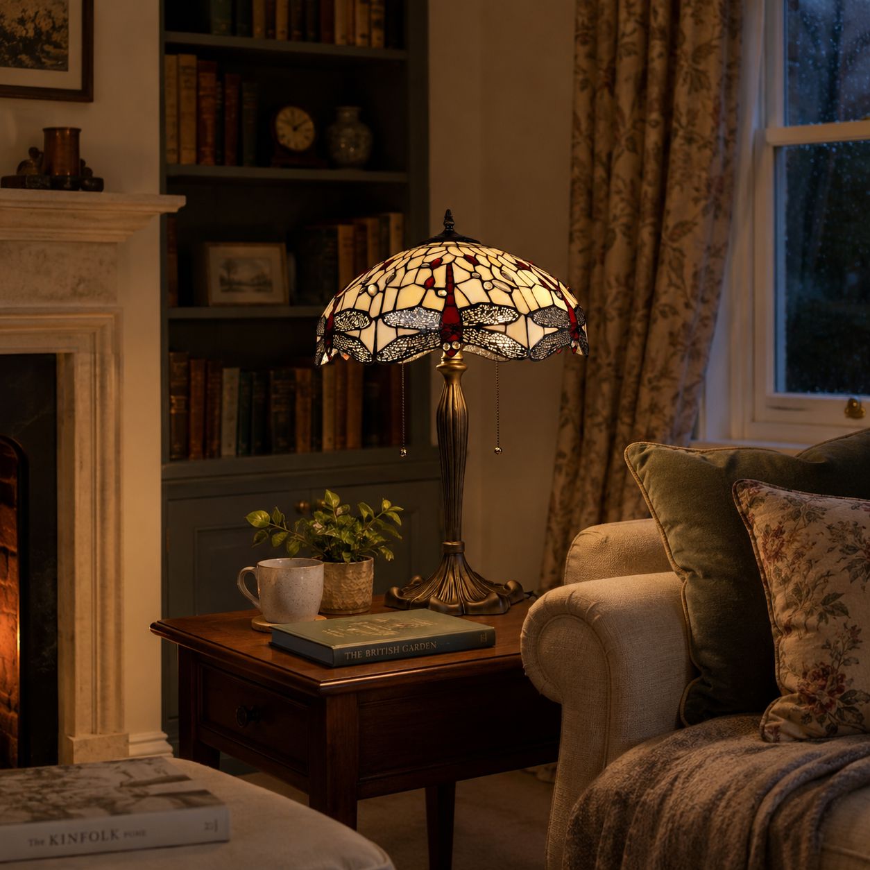 White Tiffany table lamp adding soft light to a traditional library lounge