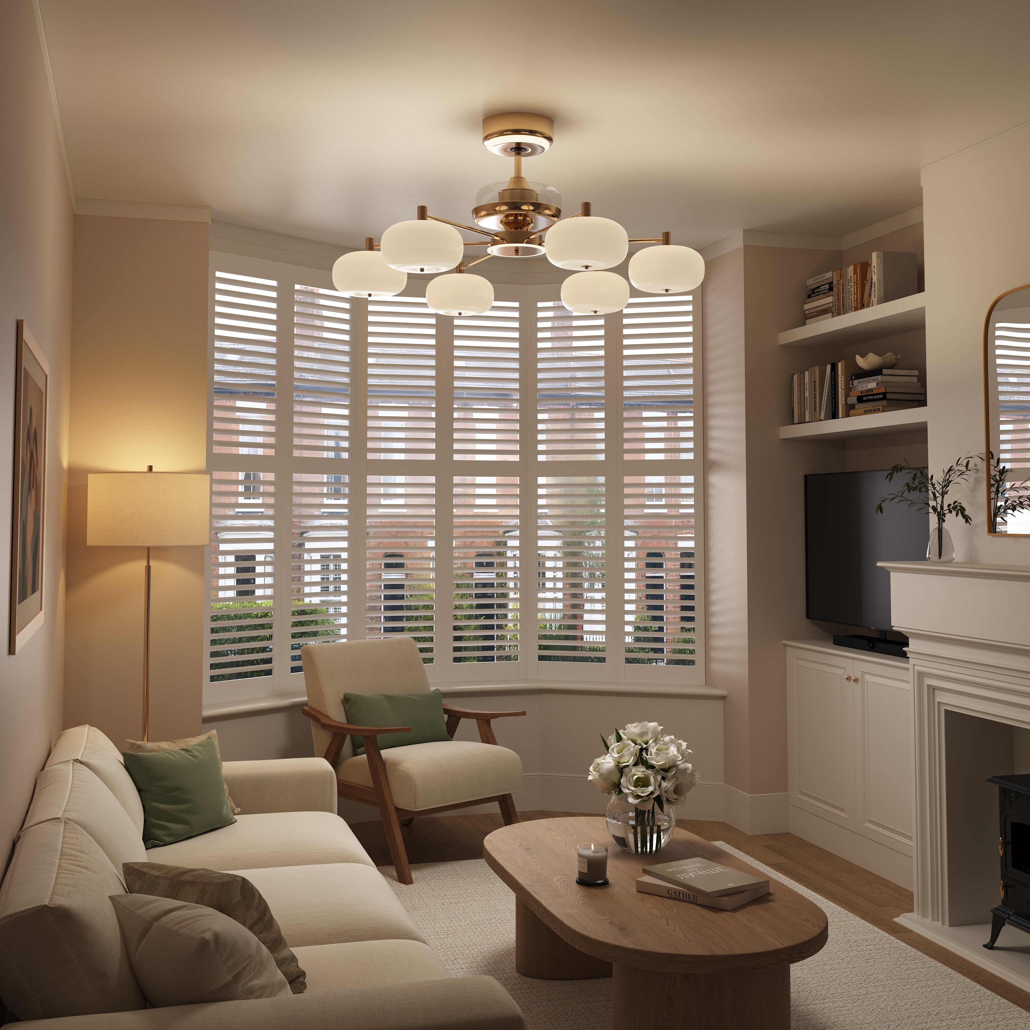Copper acrylic ceiling fan light glowing softly in a living room lounge