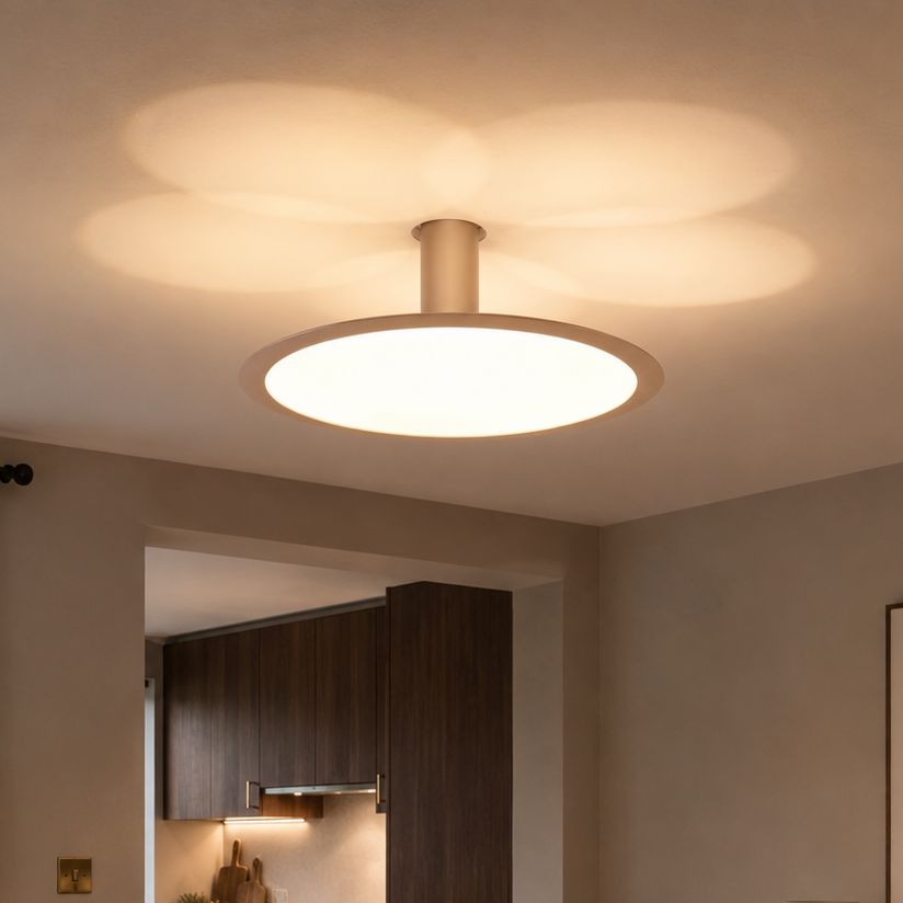 brushed rose gold aluminum pendant light in a living room