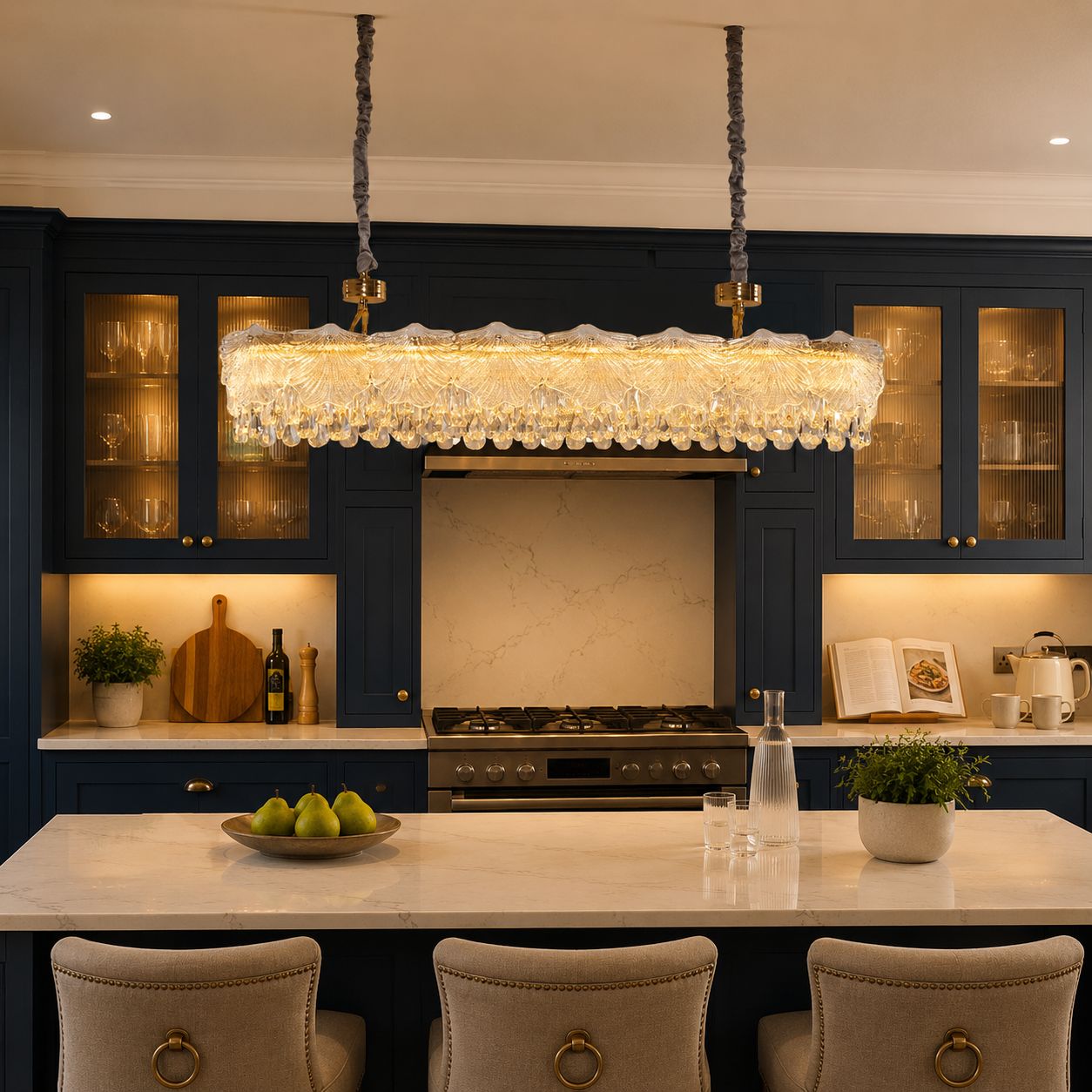 gold chandelier with crystal accents over a bright kitchen counter