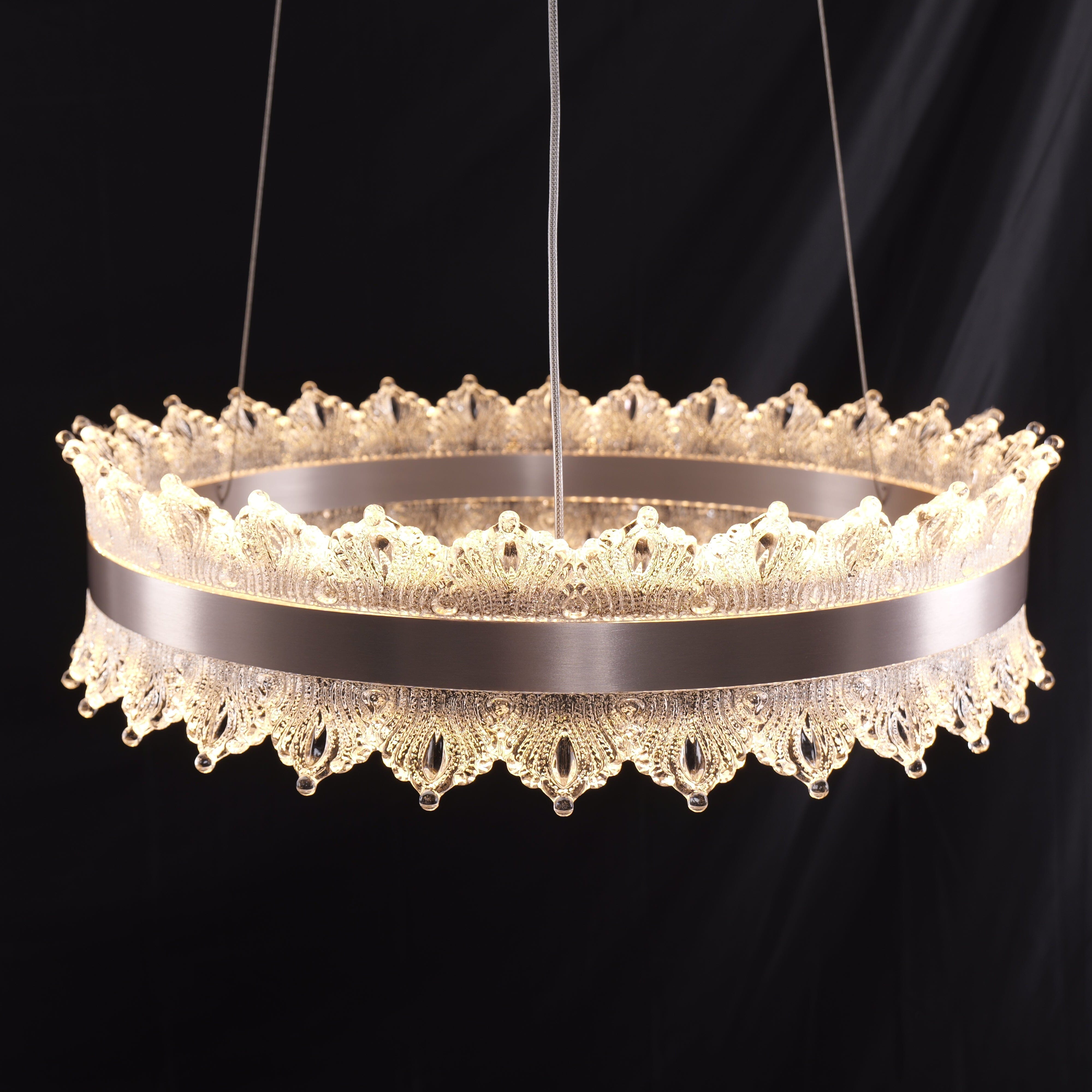 dimmable metal ring pendant light close-up of warm lit acrylic crystal panels