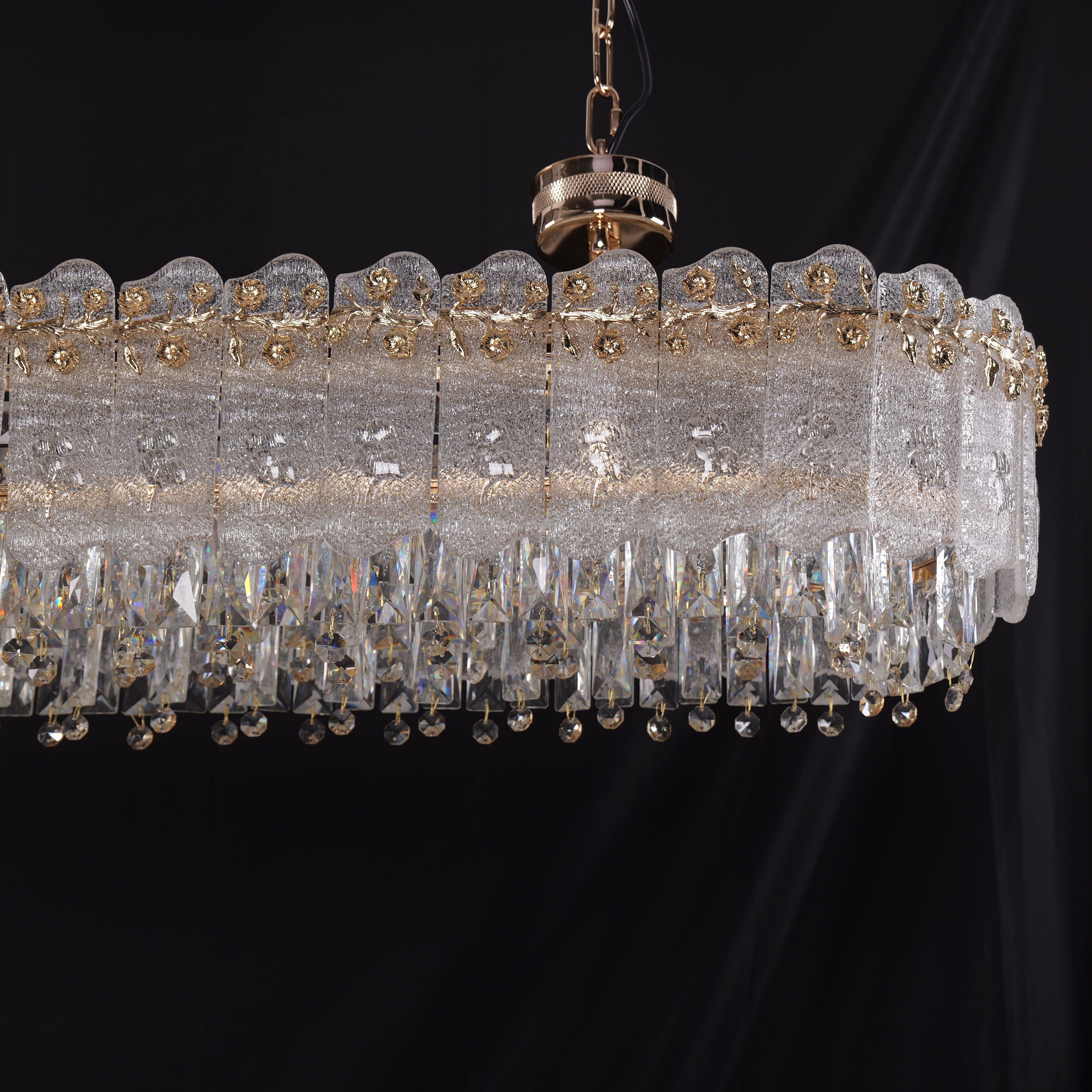 contemporary crystal oval pendant light close-up of crystal glass panels in gold frame