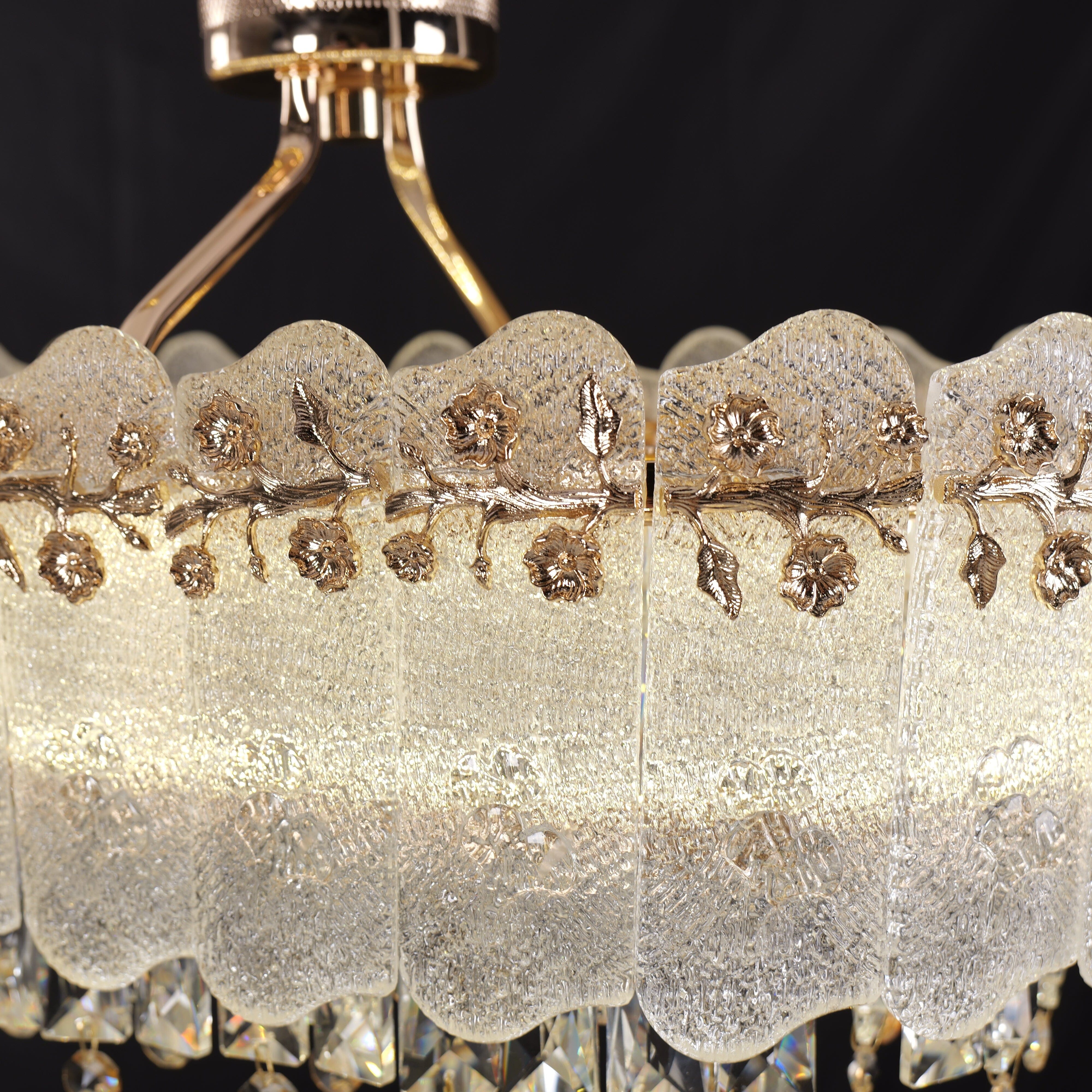 contemporary crystal oval pendant light close-up of illuminated crystal edge