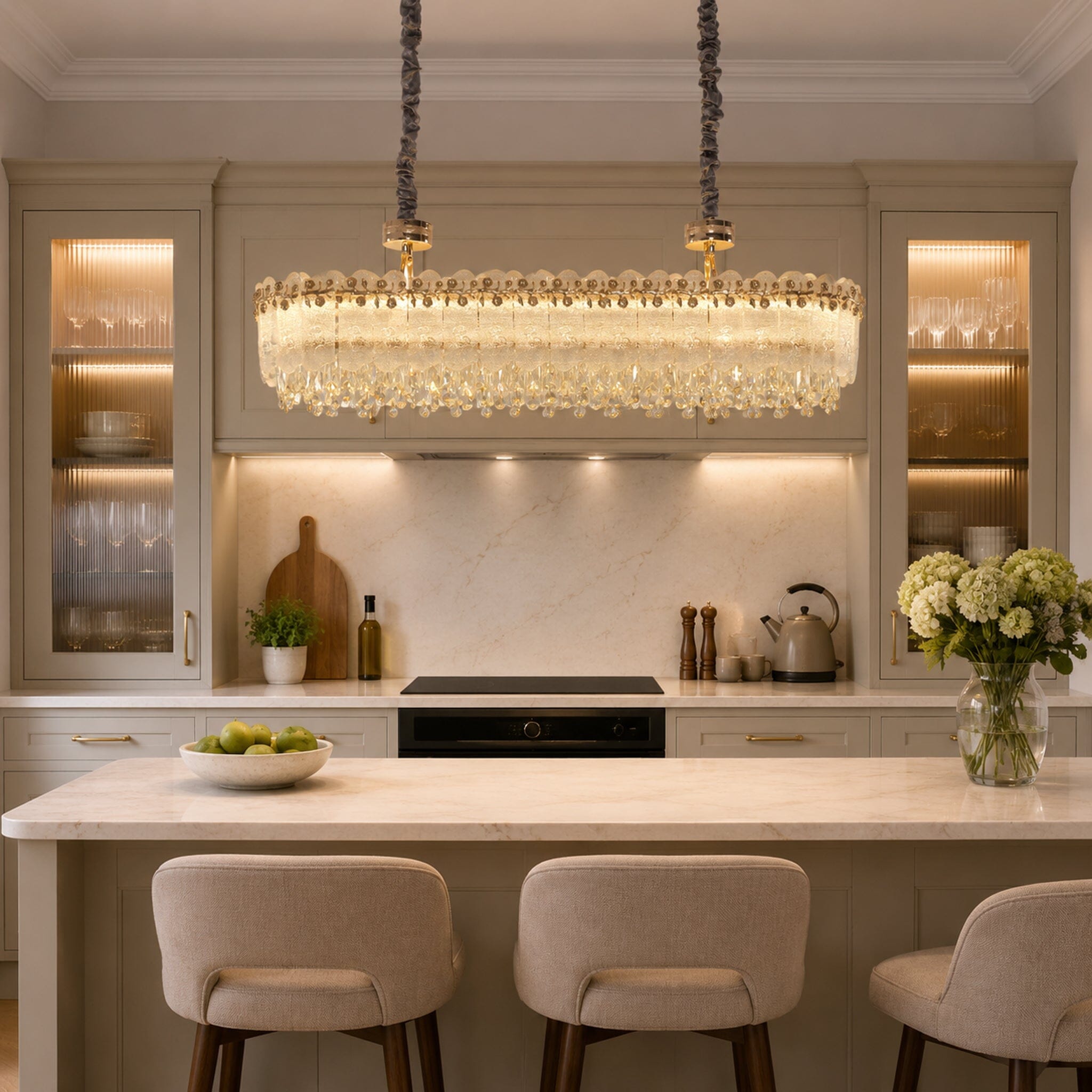contemporary crystal oval pendant light linear chandelier over a warm kitchen counter