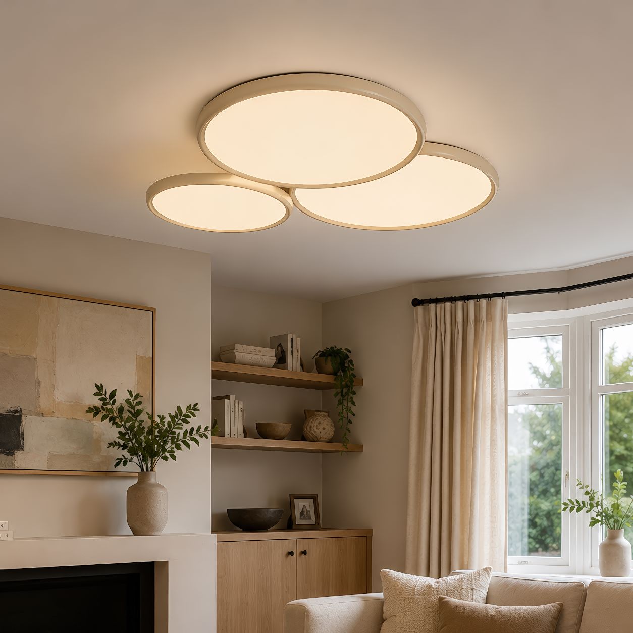 three-circle LED ceiling light in a living room with shelves