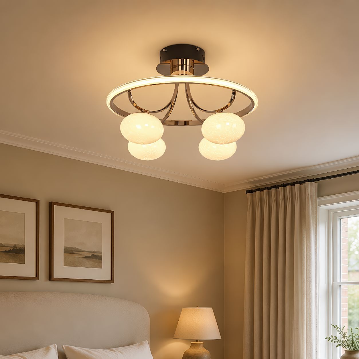 four-globe circular ceiling light above a neutral bedroom
