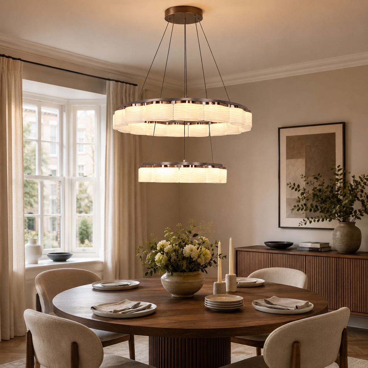 two-tier onyx glass pendant over a round dining table