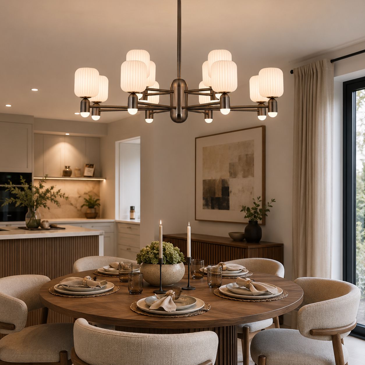 bronze chandelier above a round dining table