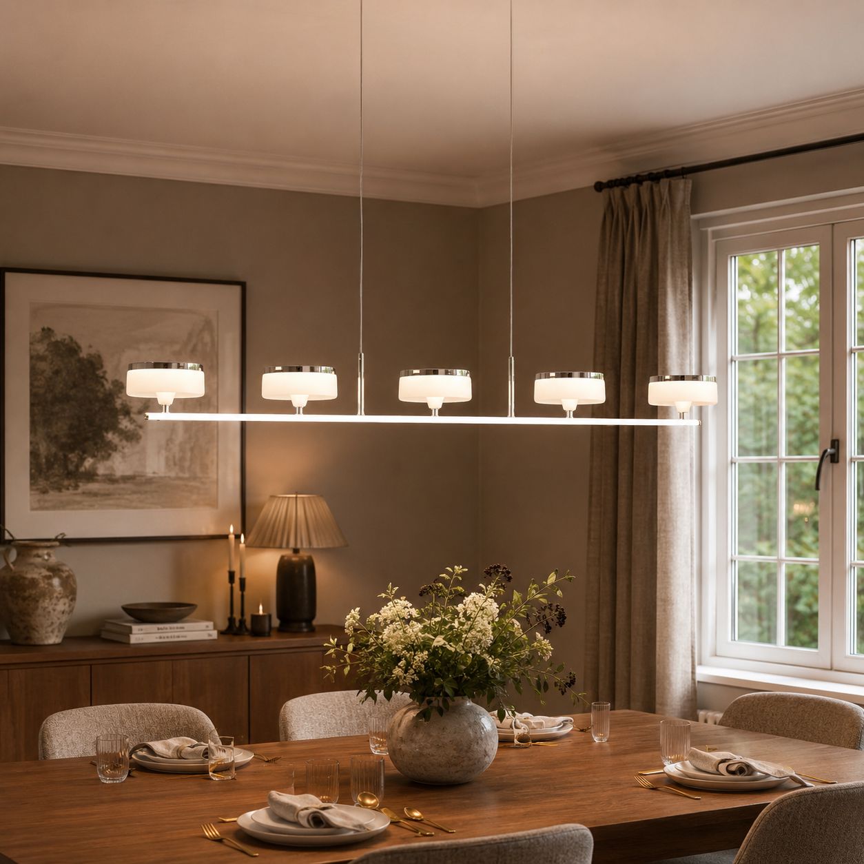 linear acrylic chandelier over a warm dining room table