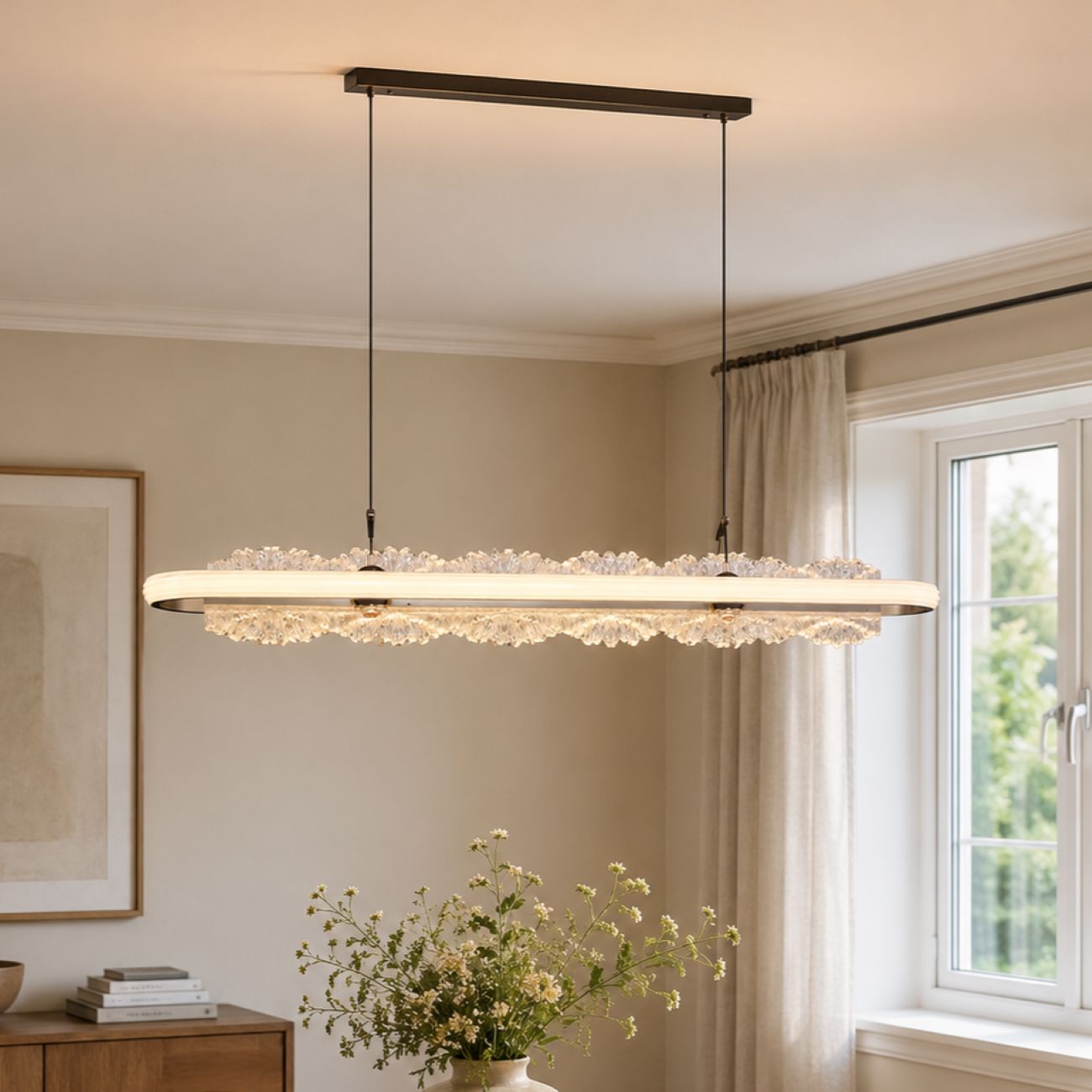 linear aluminum and acrylic pendant light beside a bright dining window