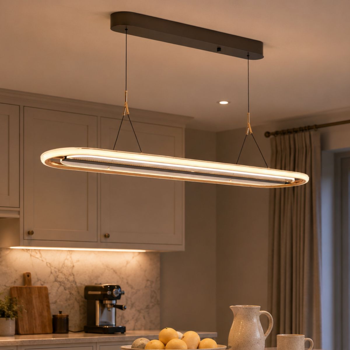 oval halo LED pendant above a kitchen island