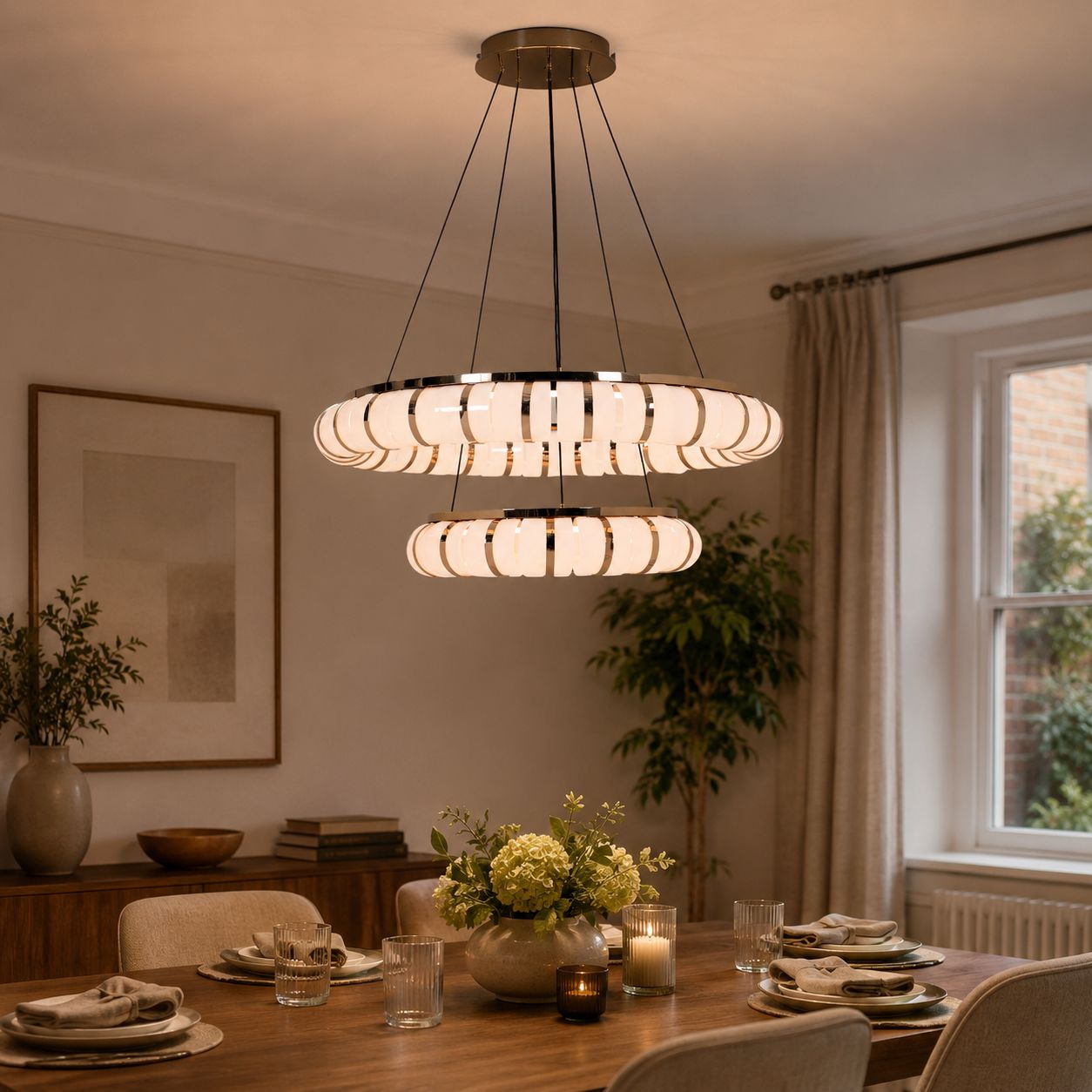 dual-ring LED pendant over a round dining table