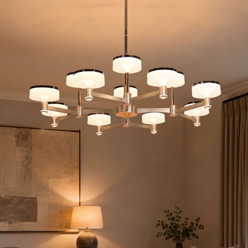 round aluminum acrylic chandelier lit in a modern living room