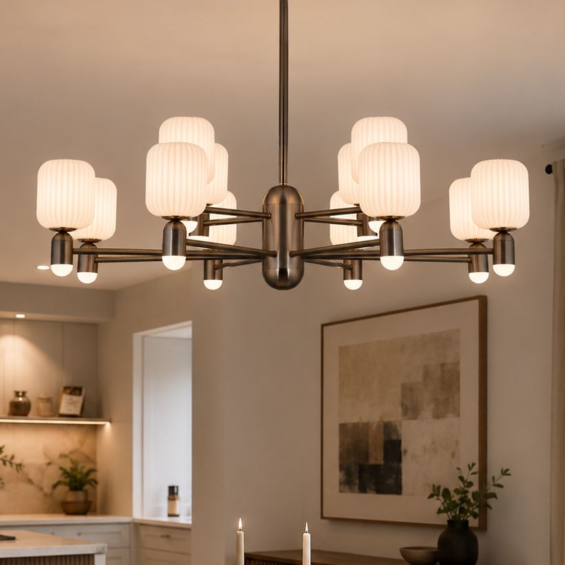 bronze chandelier with acrylic shades above a sideboard